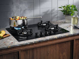 Plaque de cuisson à gaz 4 brûleurs Electrolux série 600 EGG64272K (L 59 x P 52 cm) en verre noir