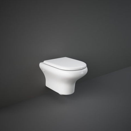 immagine-1-rak-ceramics-vaso-wc-sospeso-rak-compact-rimless-in-ceramica-attacco-230-con-scarico-a-parete-sedile-per-vaso-rak-compact-originale-ean-99580513